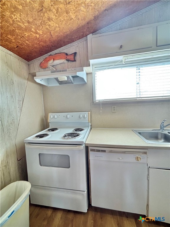 307 North 12th Port Port O'Connor, TX 77982 - Photo 14 of 45 a kitchen with a stove and a sink