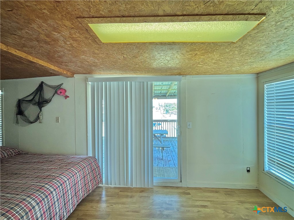 307 North 12th Port Port O'Connor, TX 77982 - Photo 24 of 45 a view of a room with wooden floor and cabinet
