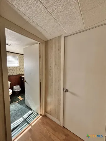 a bathroom with a sink a mirror and shower