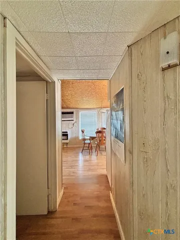 a view of house with backyard and kitchen