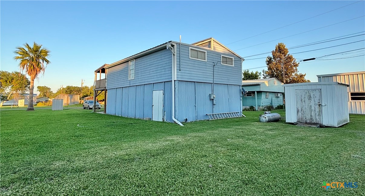 307 North 12th Port Port O'Connor, TX 77982 - Photo 40 of 45 a view of a backyard with a garden