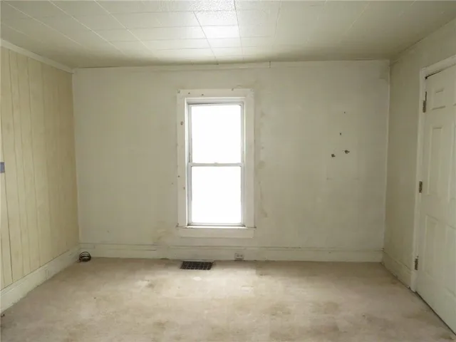 a brick building with a street