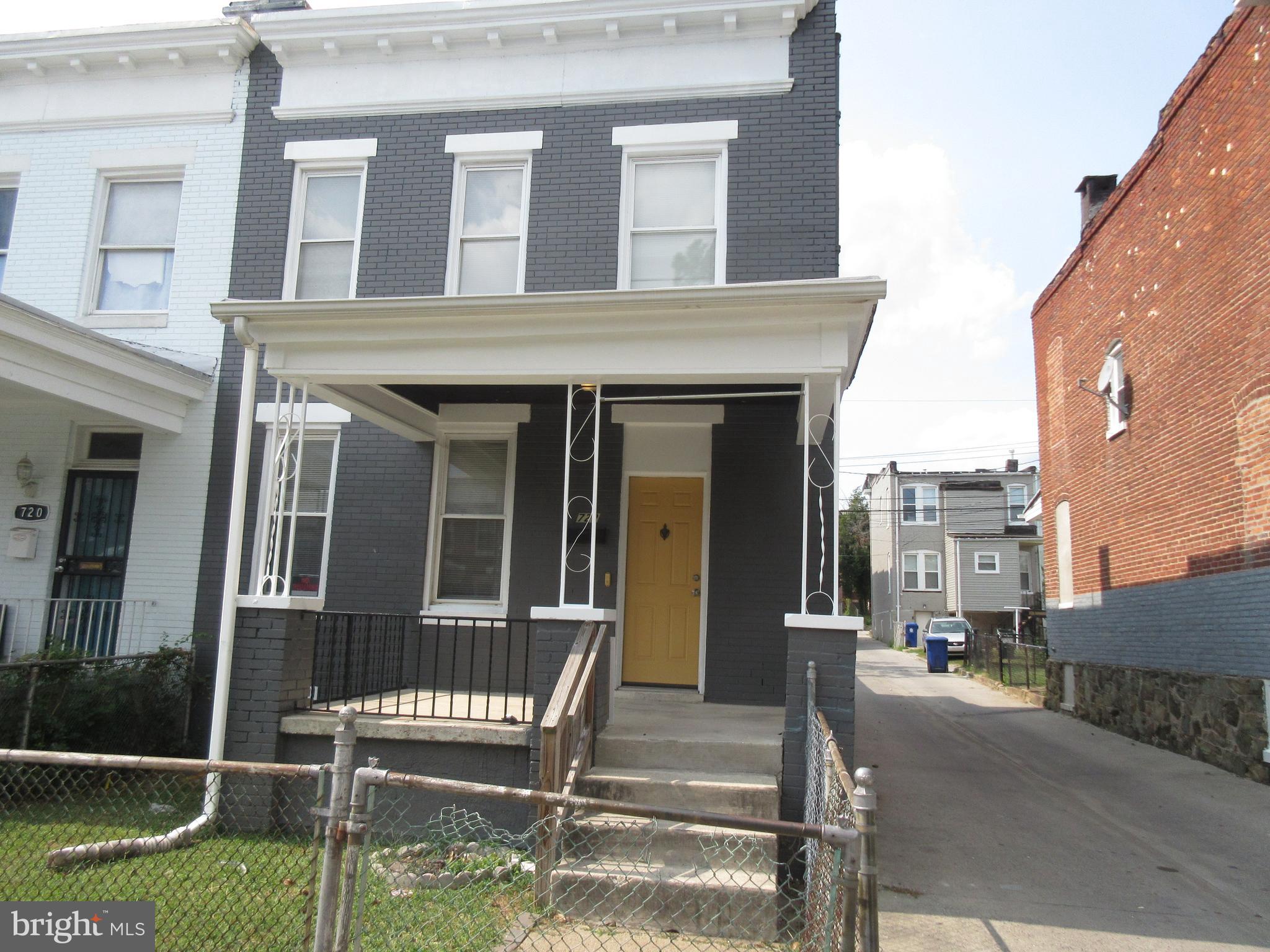 722 Edgewood Street Baltimore, MD 21229 - Photo 12 of 56 a view of a house with a yard