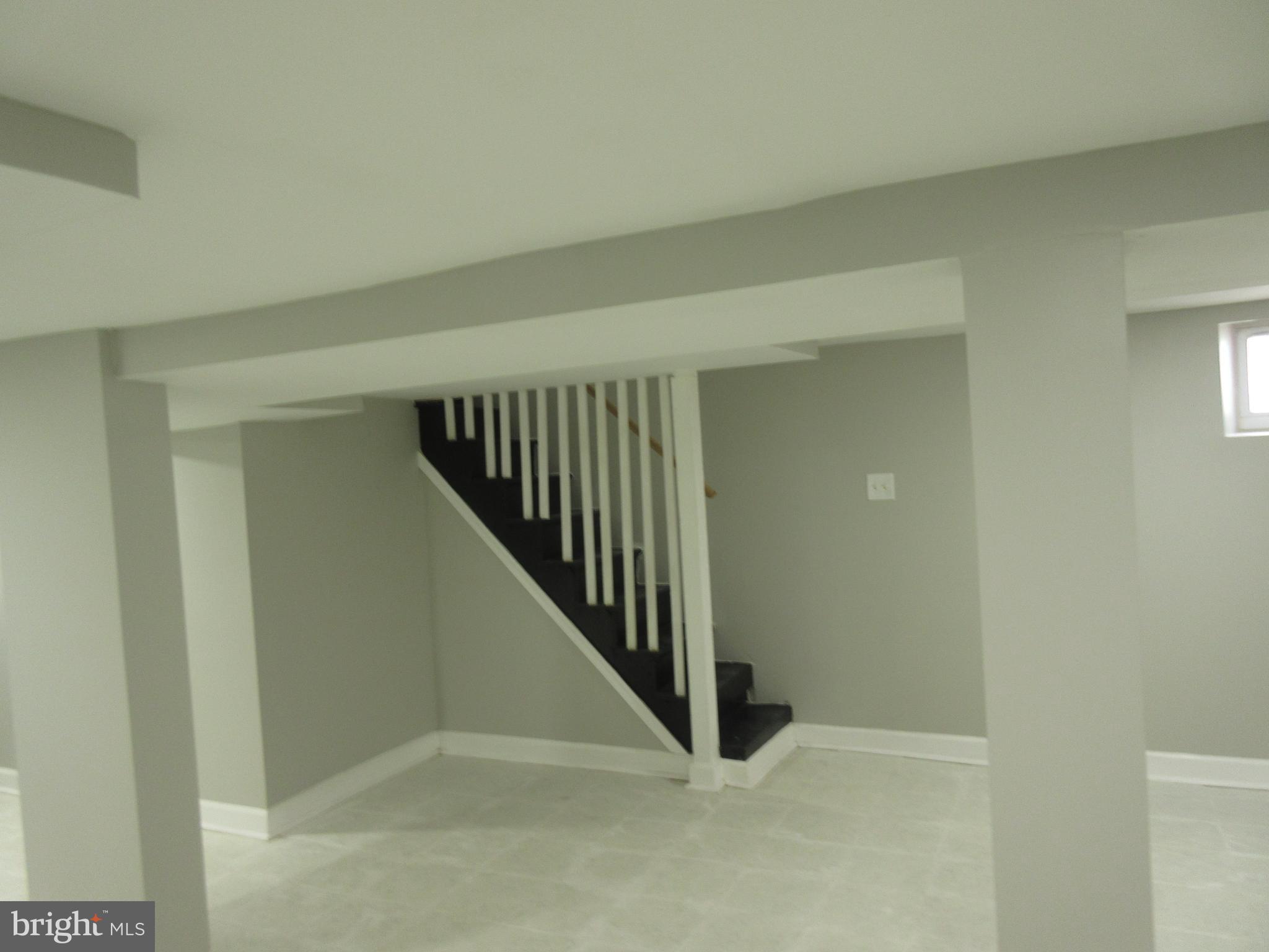 722 Edgewood Street Baltimore, MD 21229 - Photo 17 of 56 a view of hallway with stairs