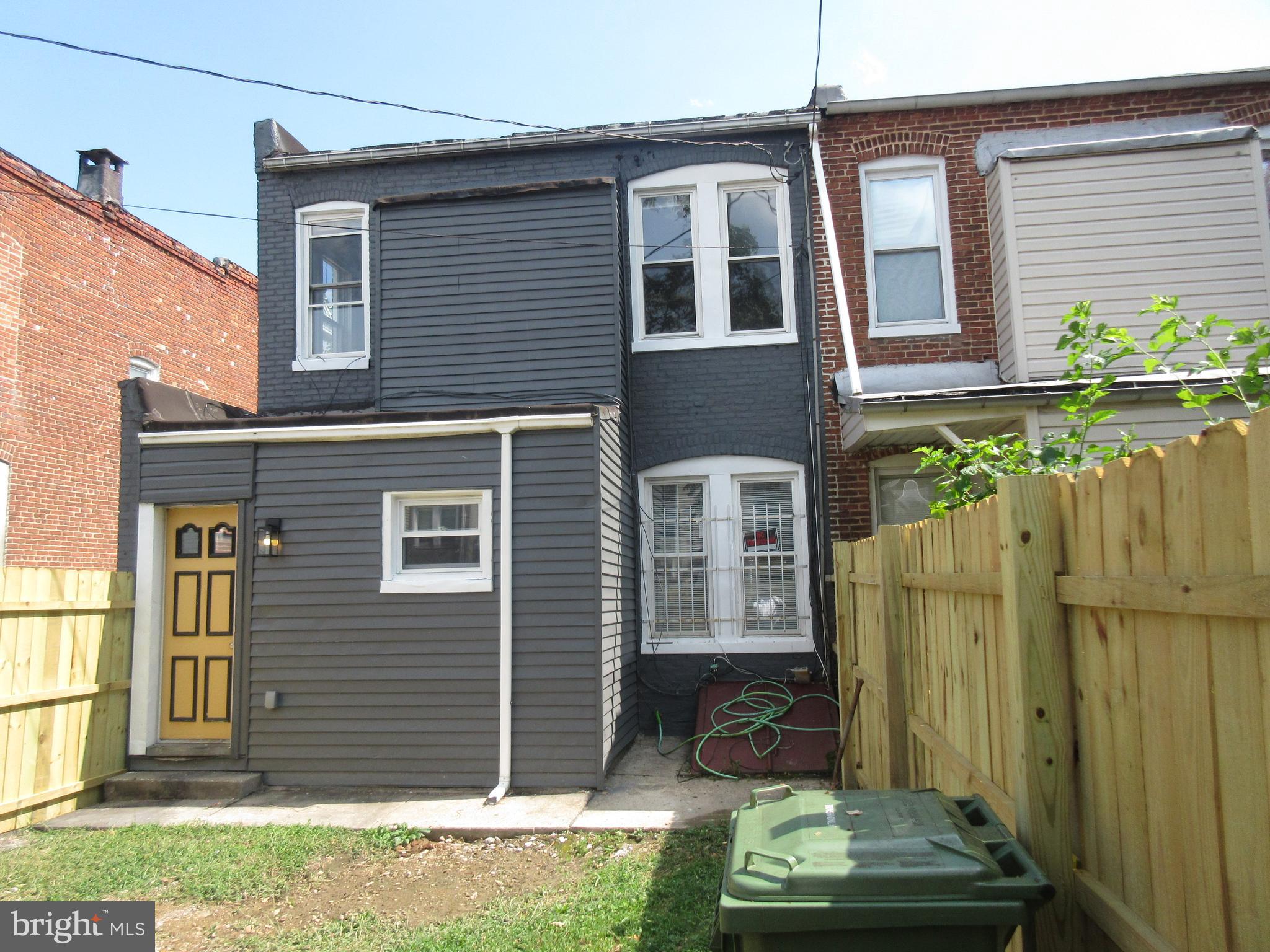 722 Edgewood Street Baltimore, MD 21229 - Photo 18 of 56 a view of a house with a backyard