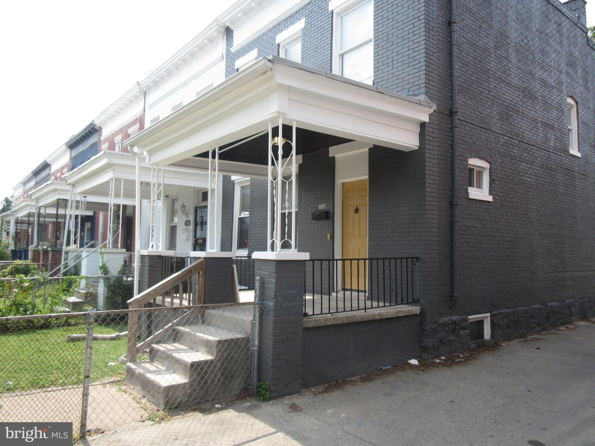 722 Edgewood Street Baltimore, MD 21229 - Photo 20 of 56 a front view of a house with a yard