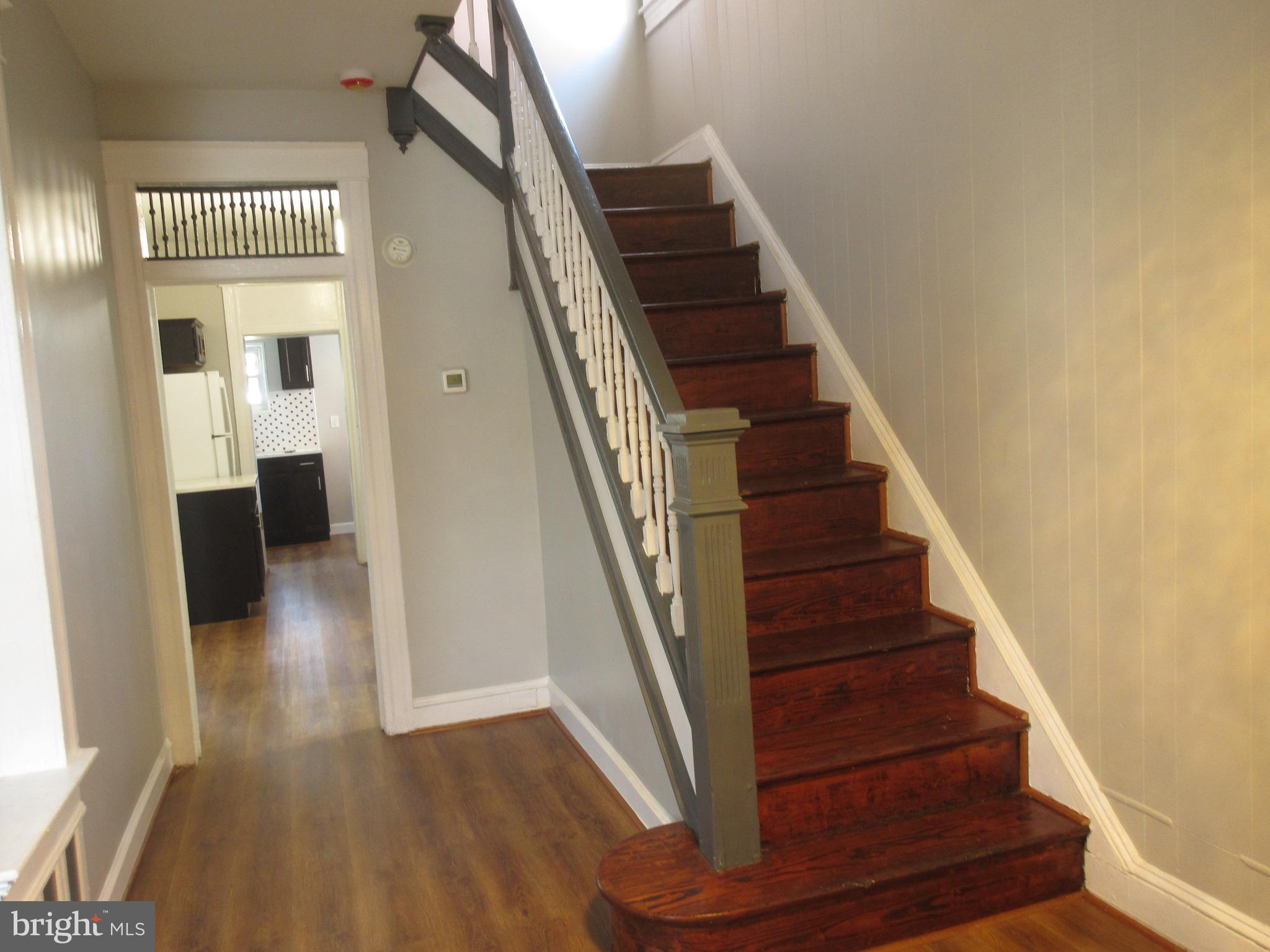 722 Edgewood Street Baltimore, MD 21229 - Photo 2 of 56 a view of entryway and hall with wooden floor