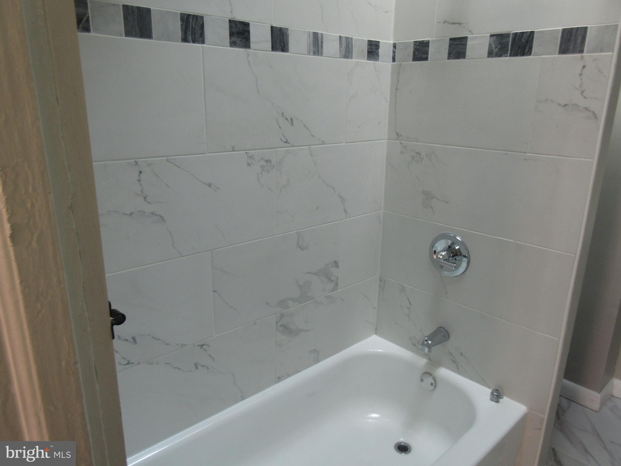 722 Edgewood Street Baltimore, MD 21229 - Photo 21 of 56 a bathroom with a sink