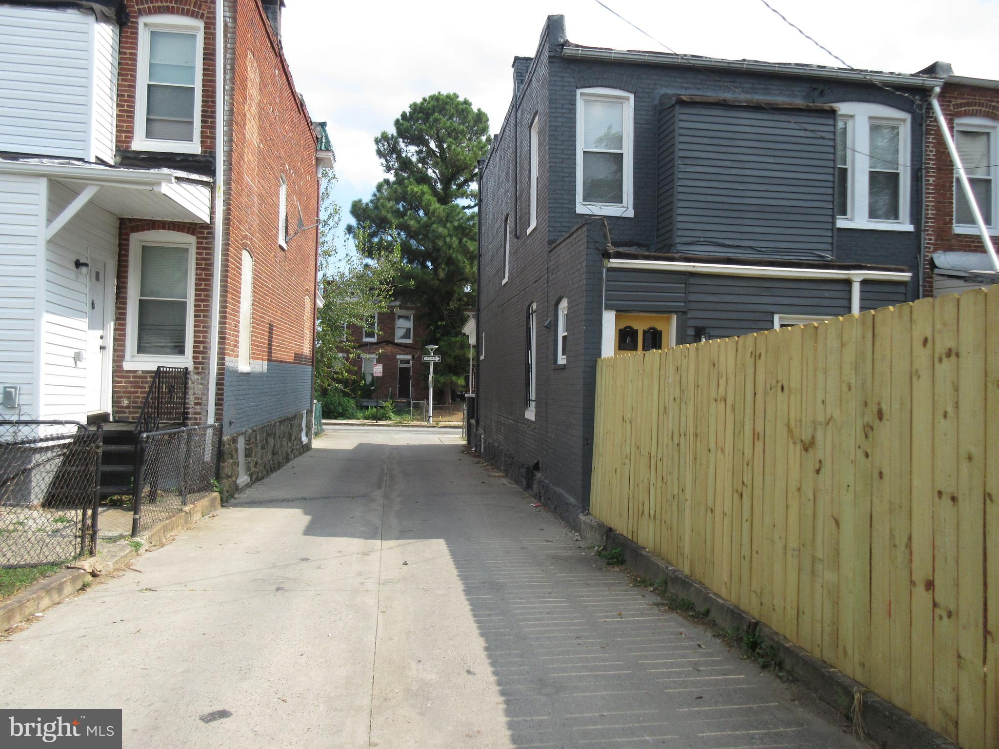 722 Edgewood Street Baltimore, MD 21229 - Photo 41 of 56 a view of a house with backyard and sitting area