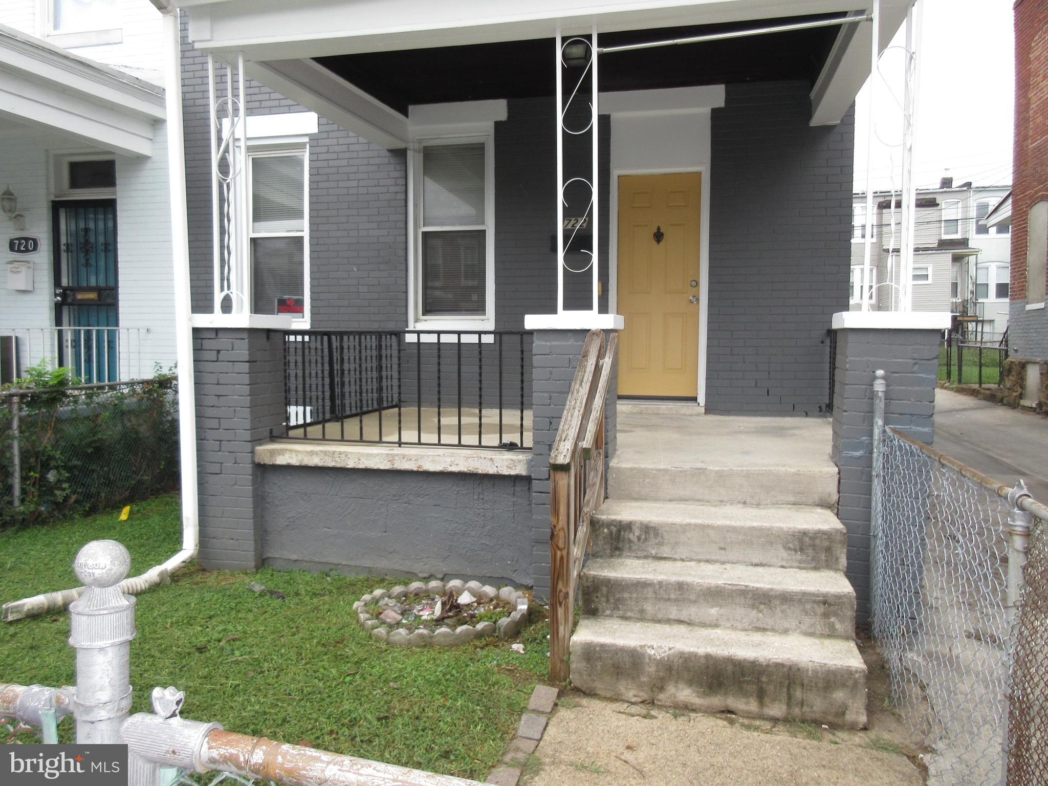 722 Edgewood Street Baltimore, MD 21229 - Photo 46 of 56 a view of a chair and table in backyard