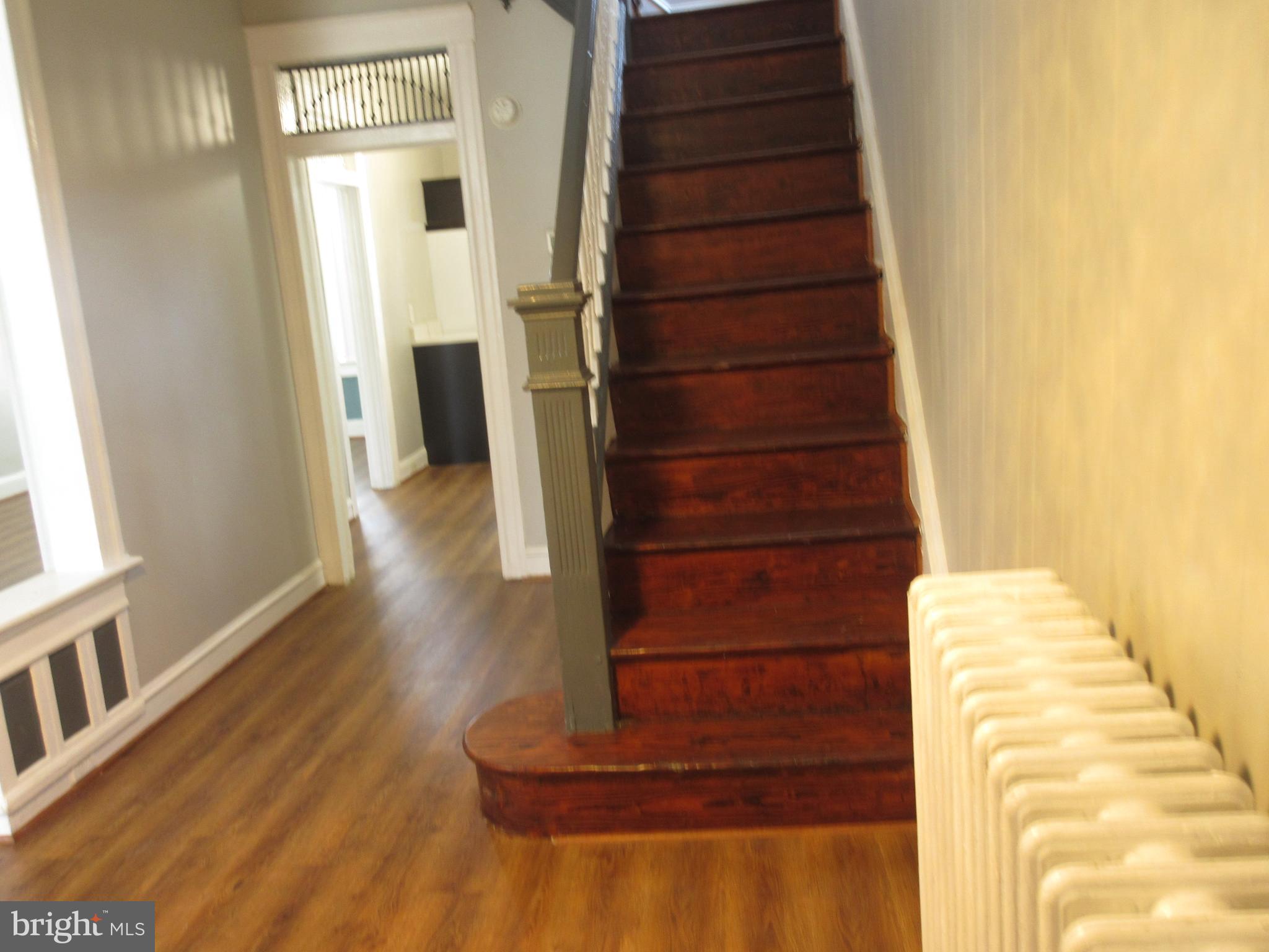 722 Edgewood Street Baltimore, MD 21229 - Photo 7 of 56 a view of entryway with wooden floor
