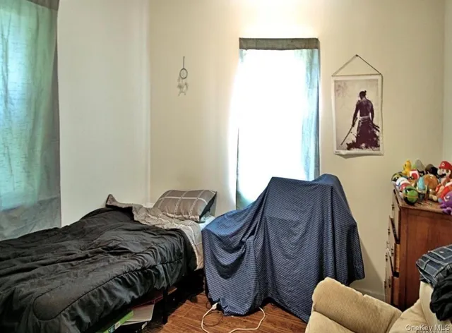 a view of a livingroom with furniture and a gallery