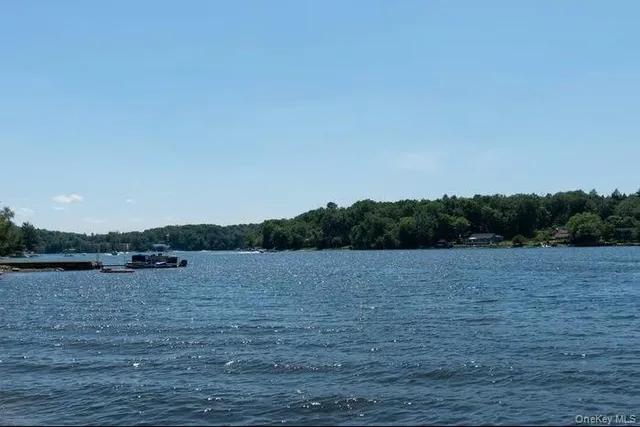 a view of outdoor space and a lake view