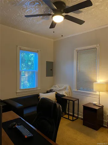 a kitchen with a stove a sink and a microwave