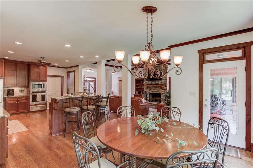 2240 Pear Grove Court Jefferson, GA 30549 - Photo 15 of 85 a view of a dining room with furniture