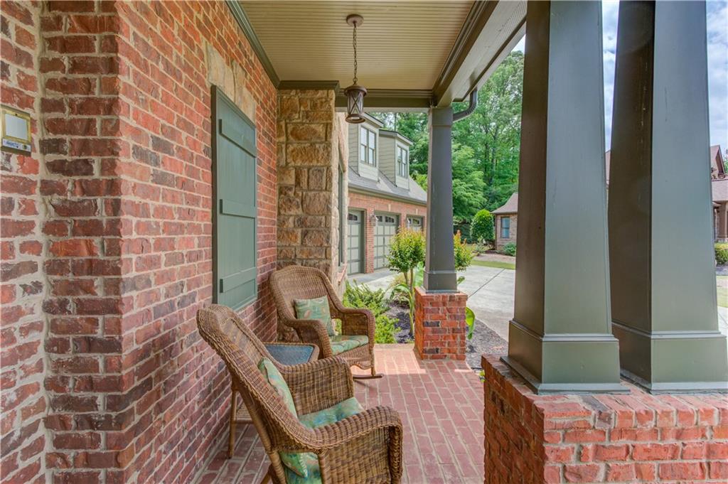 2240 Pear Grove Court Jefferson, GA 30549 - Photo 2 of 85 a front view of a house with outdoor seating