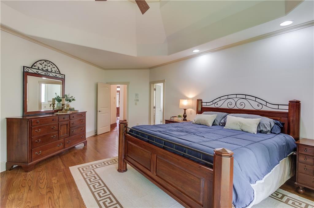 2240 Pear Grove Court Jefferson, GA 30549 - Photo 22 of 85 a bedroom with a bed and a dresser