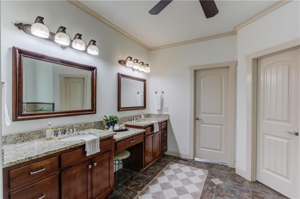 2240 Pear Grove Court Jefferson, GA 30549 - Photo 24 of 85 a spacious bathroom with a double vanity sink and a mirror