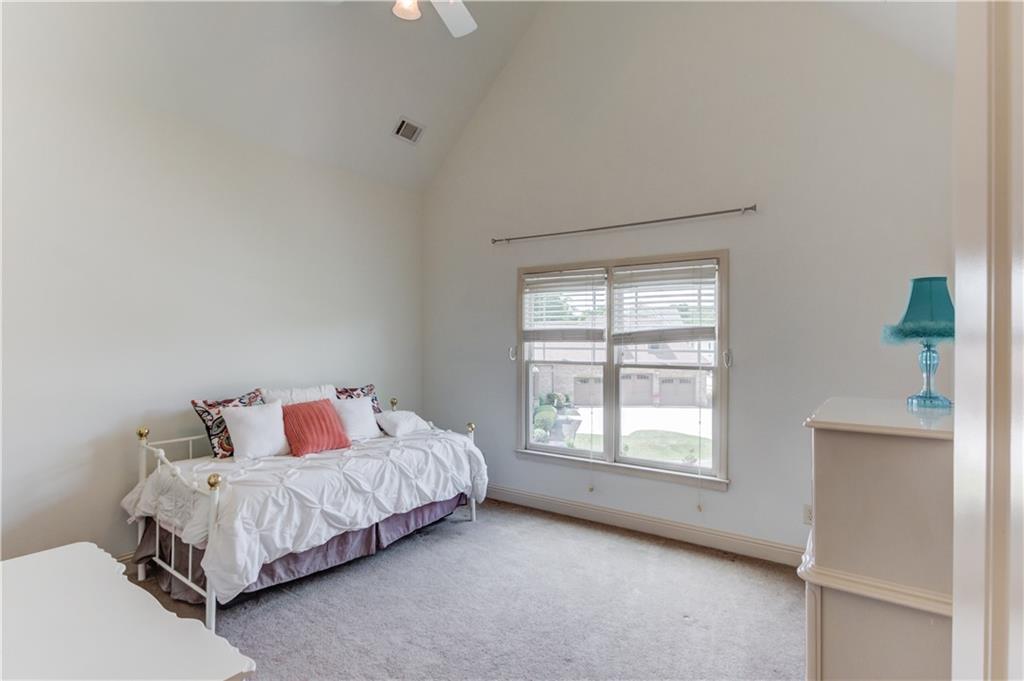 2240 Pear Grove Court Jefferson, GA 30549 - Photo 37 of 85 a bedroom with a bed and a window