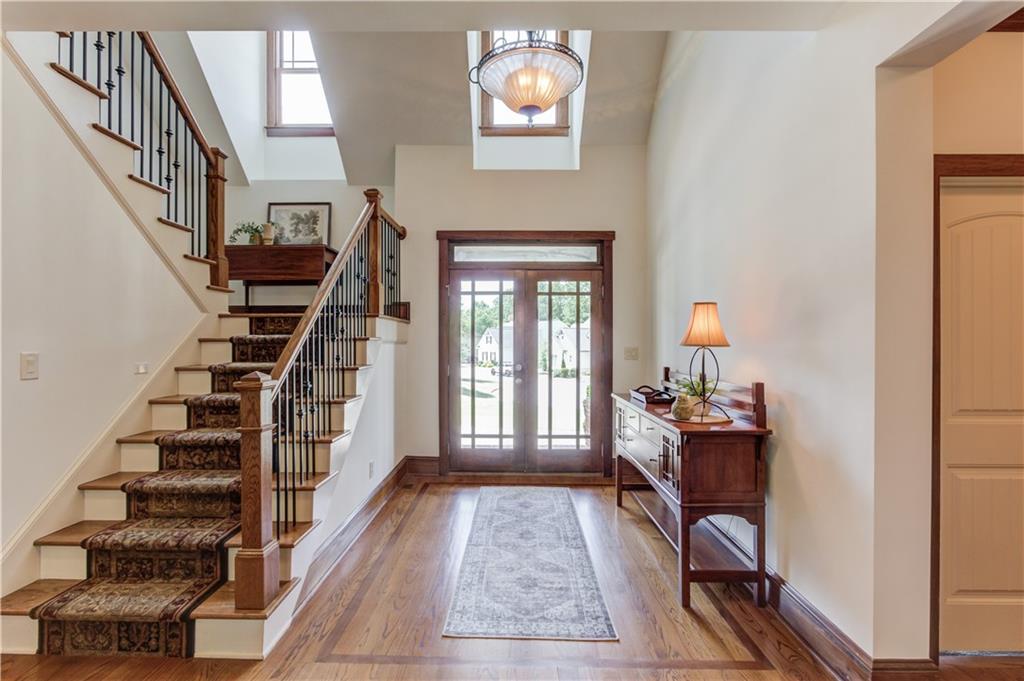 2240 Pear Grove Court Jefferson, GA 30549 - Photo 4 of 85 a view of entryway and hall with wooden floor