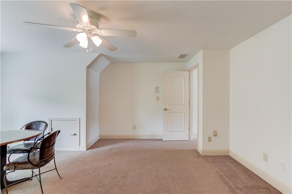 2240 Pear Grove Court Jefferson, GA 30549 - Photo 46 of 85 a view of a livingroom with a chandelier