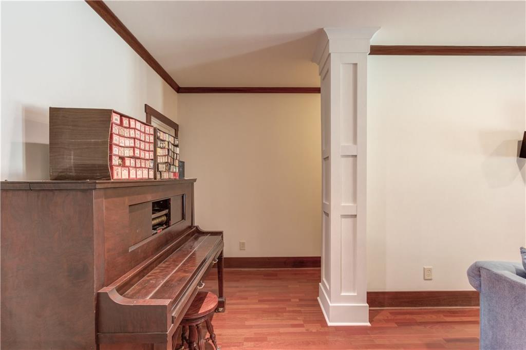 2240 Pear Grove Court Jefferson, GA 30549 - Photo 52 of 85 a view of an empty room with wooden floor and a window