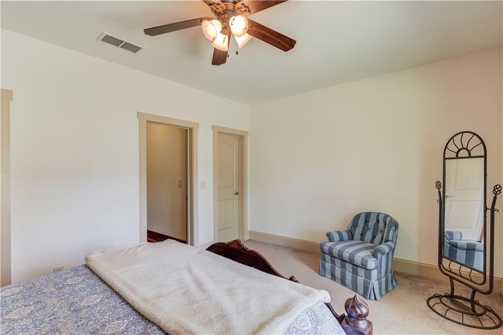 2240 Pear Grove Court Jefferson, GA 30549 - Photo 64 of 85 a bedroom with furniture and a window