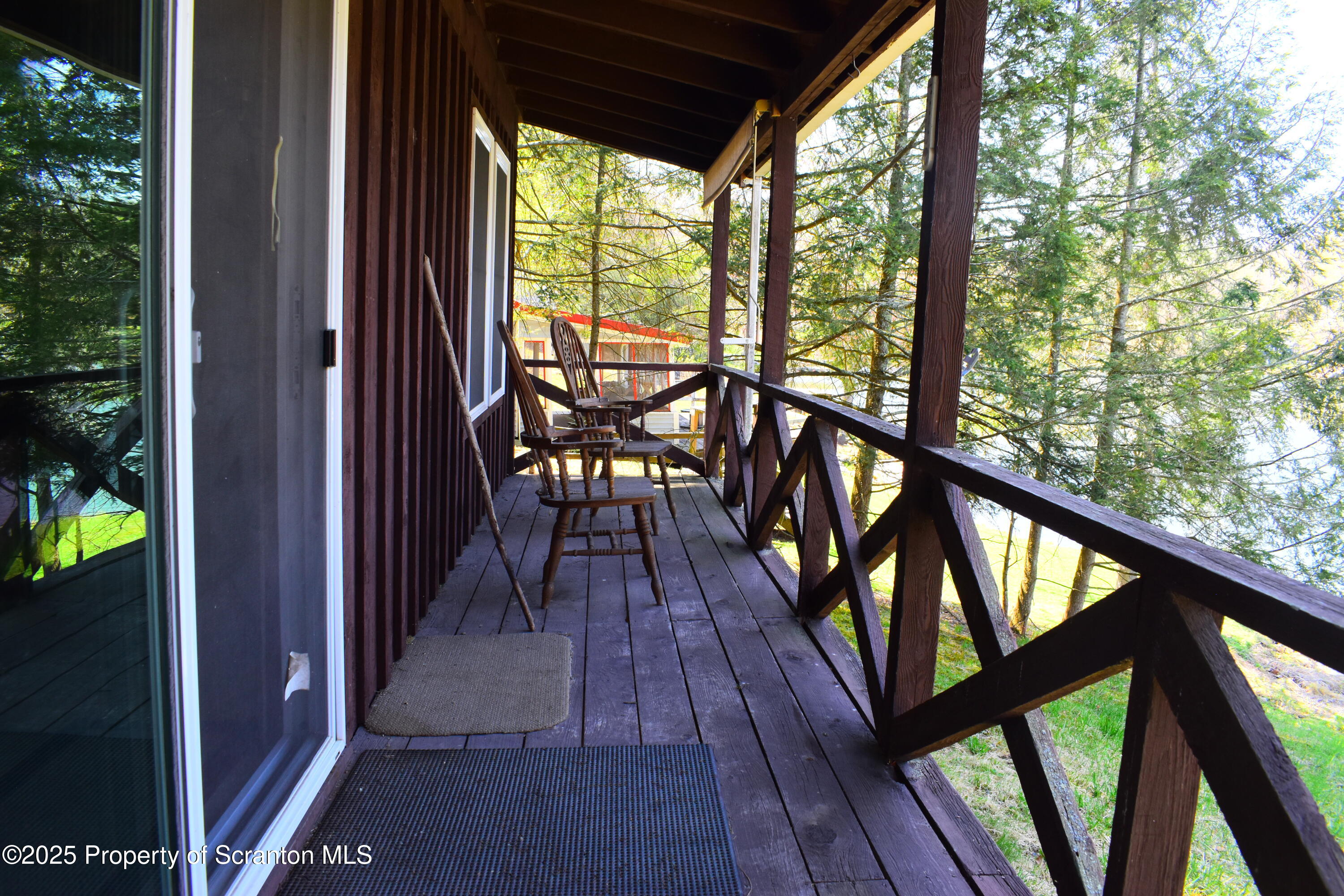 125 Crescent Lake Road Meshoppen, PA 18630 - Photo 16 of 23 Covered porch facing lake
