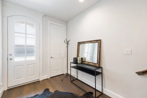 a room with a bed and a window