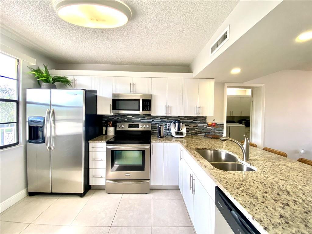 6037 Balboa Circle, Unit 304 Boca Raton, FL 33433 - Photo 7 of 51 Photo 7