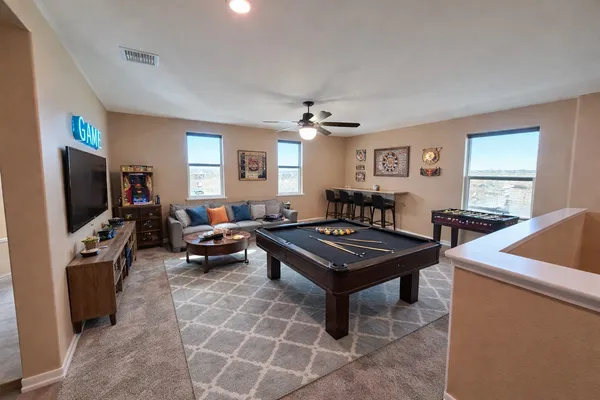 a bathroom with a double vanity sink toilet and shower