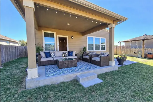 a view of a porch of a house