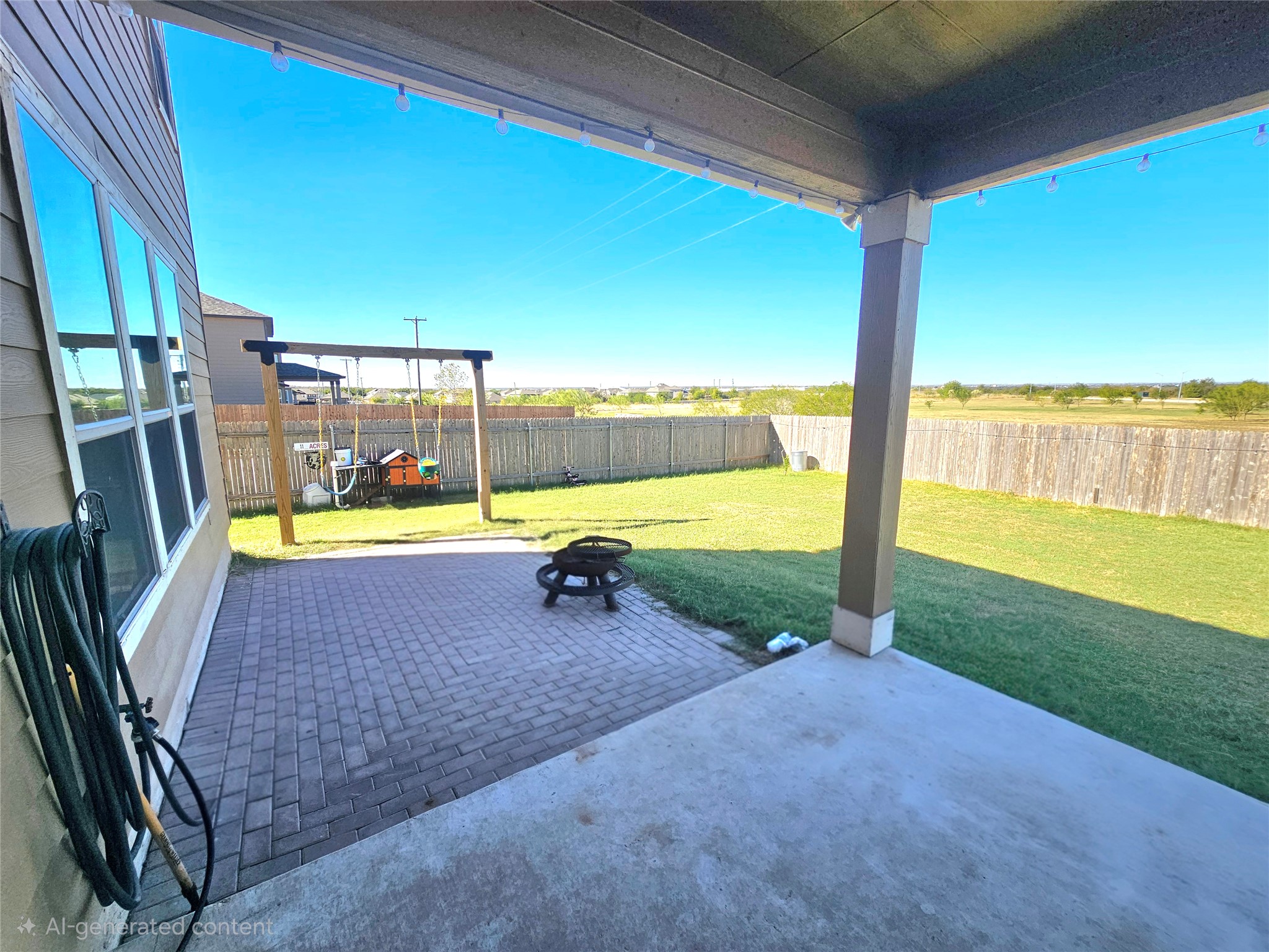 120 Schuylerville Drive Elgin, TX 78621 - Photo 25 of 29 Fenced backyard with a covered patio