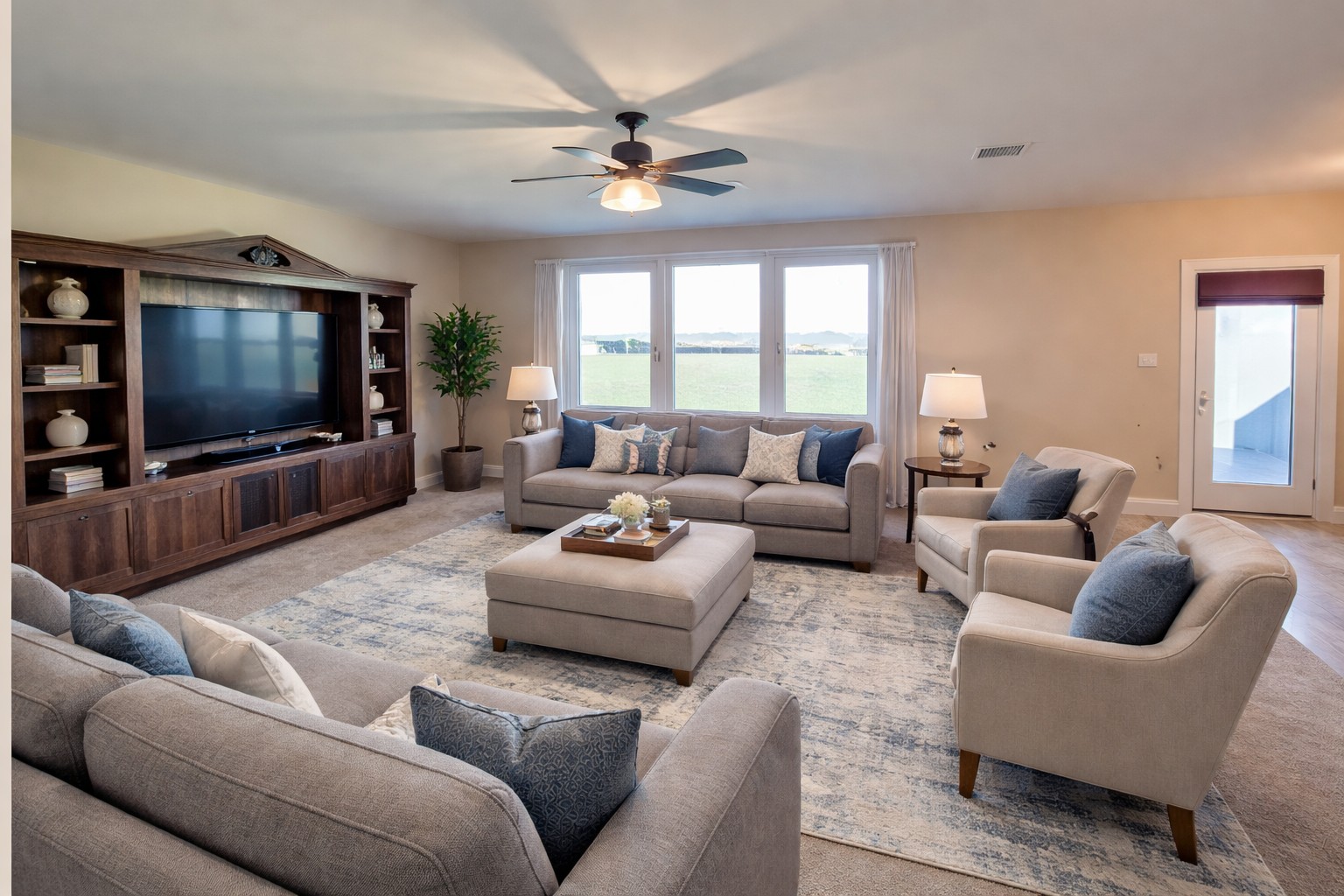 120 Schuylerville Drive Elgin, TX 78621 - Photo 8 of 29 Staged by AI
Carpeted living room featuring a ceiling fan and baseboards