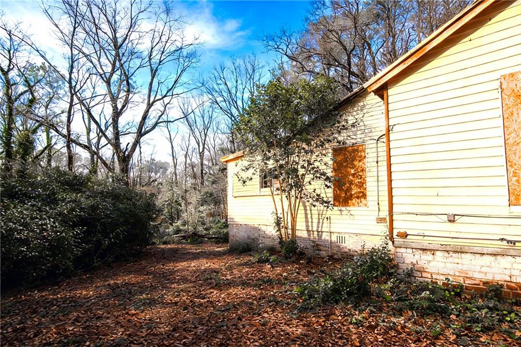 731 Bolton Road Northwest Atlanta, GA 30331 - Photo 7 of 20 a view of a house with a yard