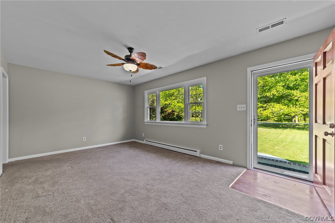 5525 Qualla Road Chesterfield, VA 23832 - Photo 14 of 50 wooden floor in an empty room with a window