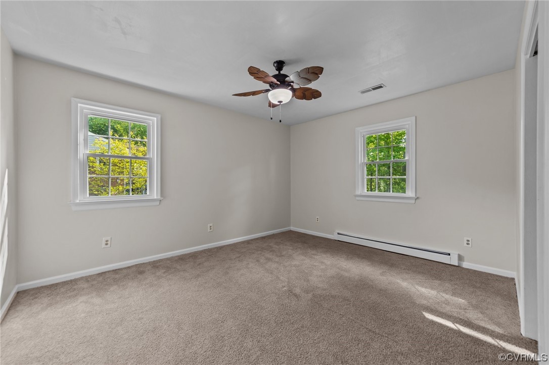5525 Qualla Road Chesterfield, VA 23832 - Photo 26 of 50 an empty room with a window and a fan