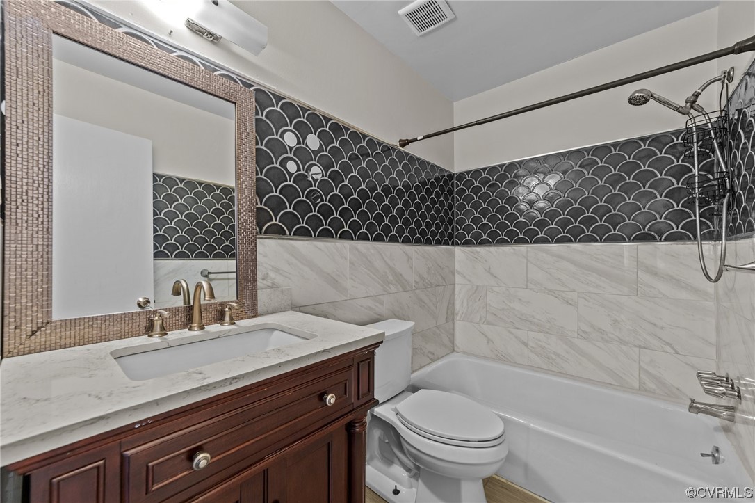 5525 Qualla Road Chesterfield, VA 23832 - Photo 33 of 50 a bathroom with a sink a toilet and a bathtub