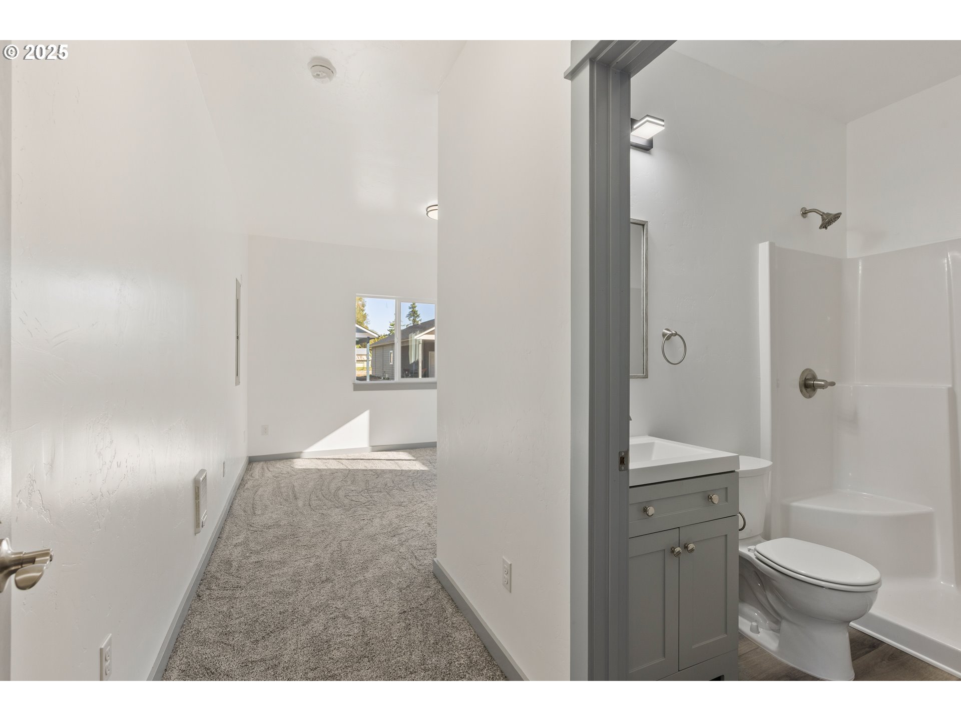 2104 True Avenue La Grande, OR 97850 - Photo 8 of 15 a bathroom with a toilet a sink and shower