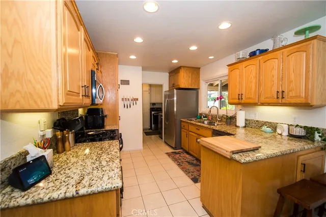 a bathroom with a double vanity sink and mirror
