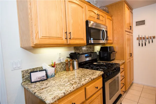 a bathroom with a toilet and shower