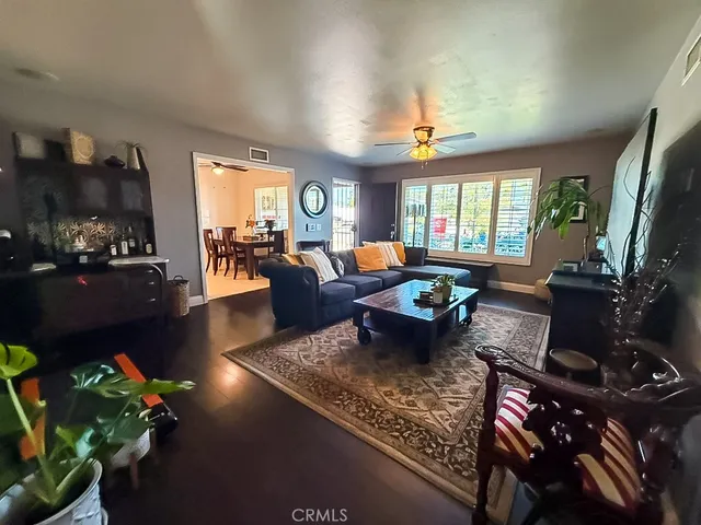 an aerial view of a house with a yard and lake view