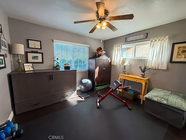 a outdoor living space with furniture and a potted plant