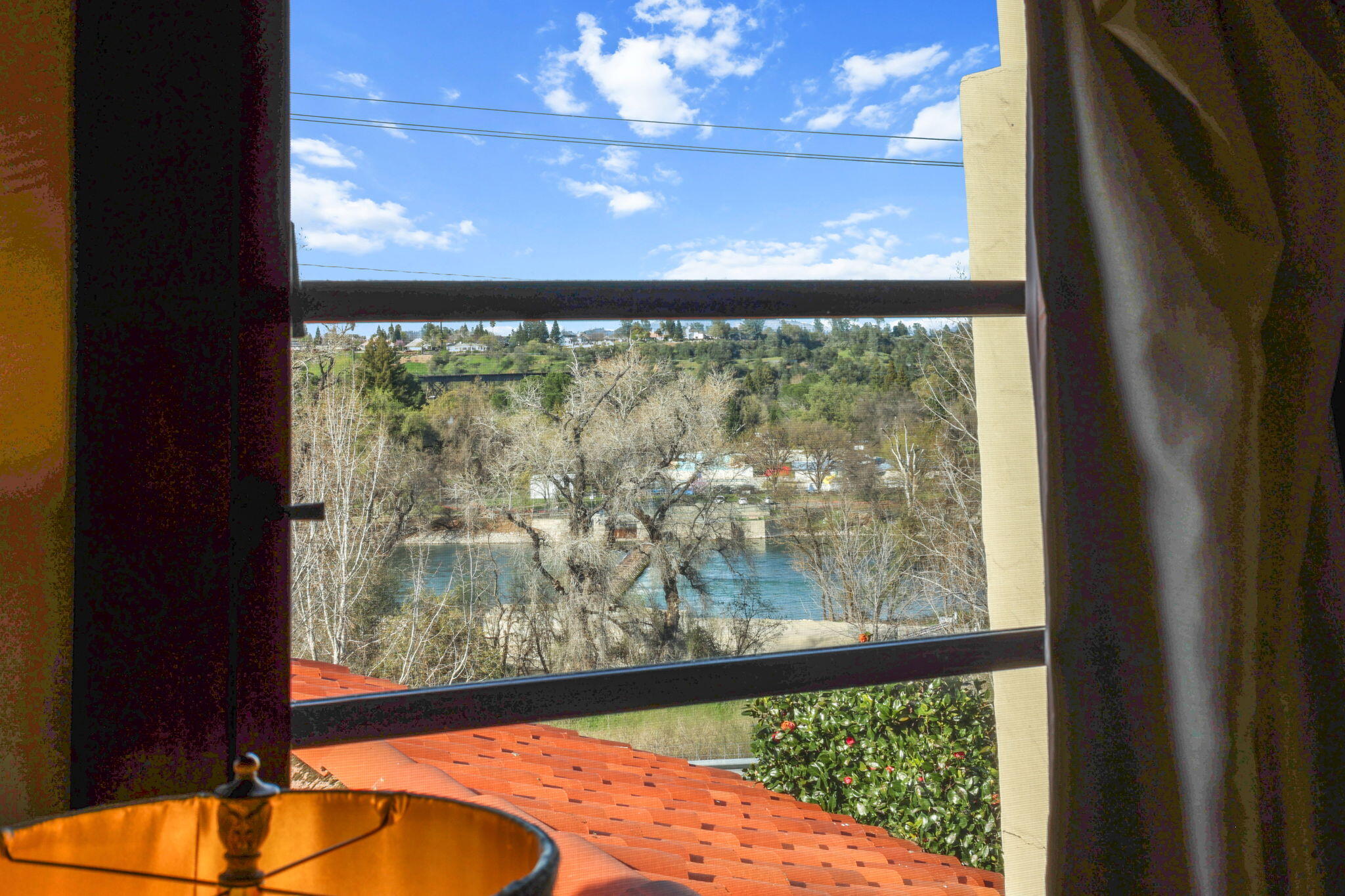1465 Riverside Drive Redding, CA 96001 - Photo 15 of 163 a view of a large window with an outdoor space