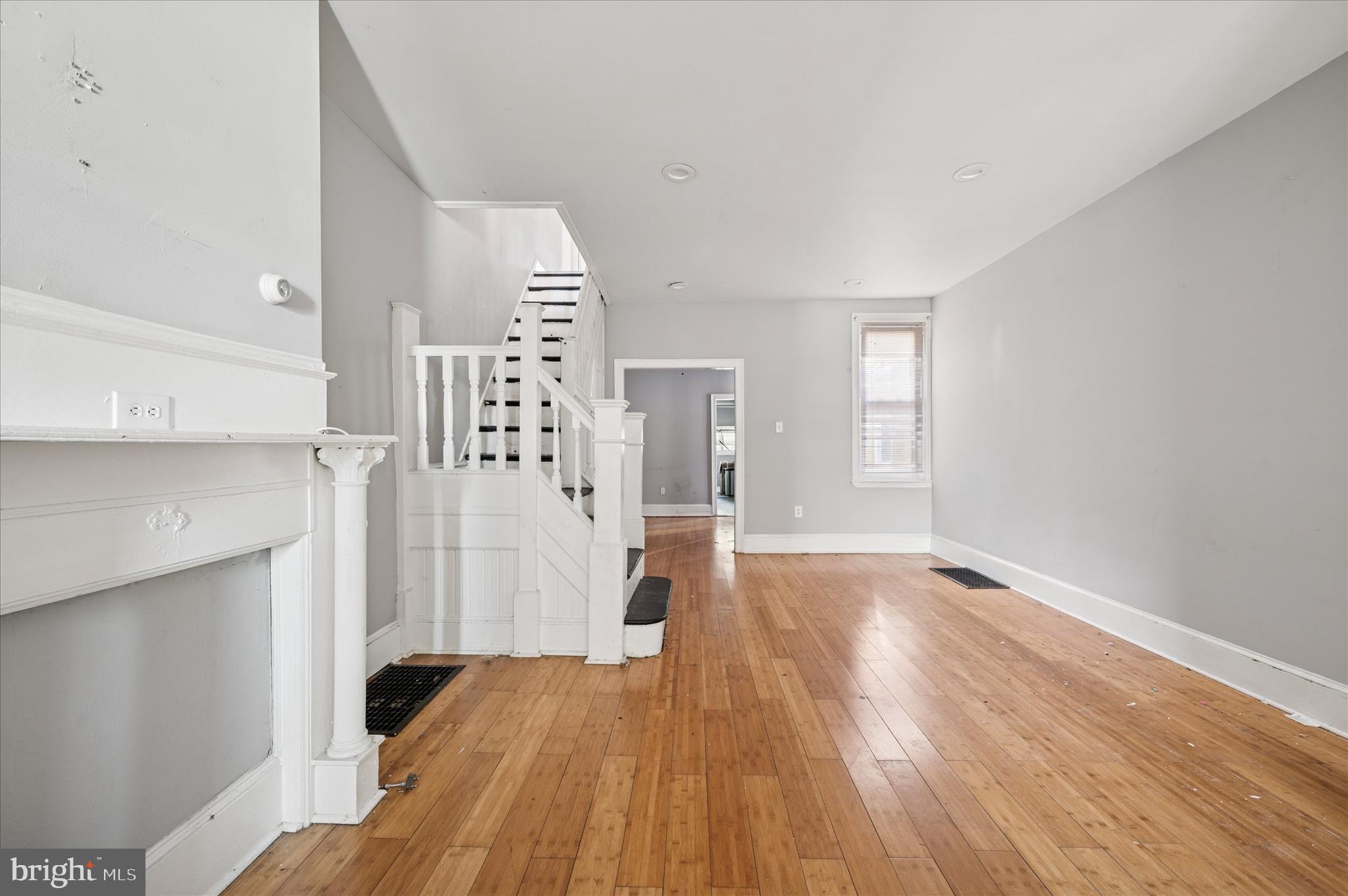 809 East Locust Avenue Philadelphia, PA 19138 - Photo 11 of 23 a view of livingroom with hardwood floor and window