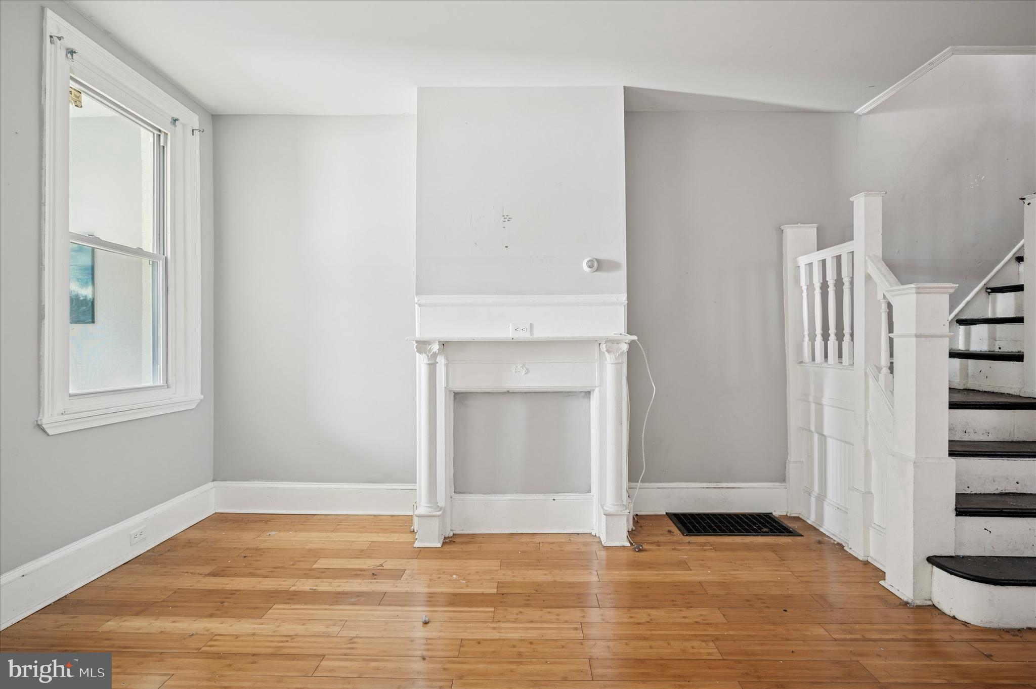 809 East Locust Avenue Philadelphia, PA 19138 - Photo 12 of 23 a view of empty room with wooden floor and fan