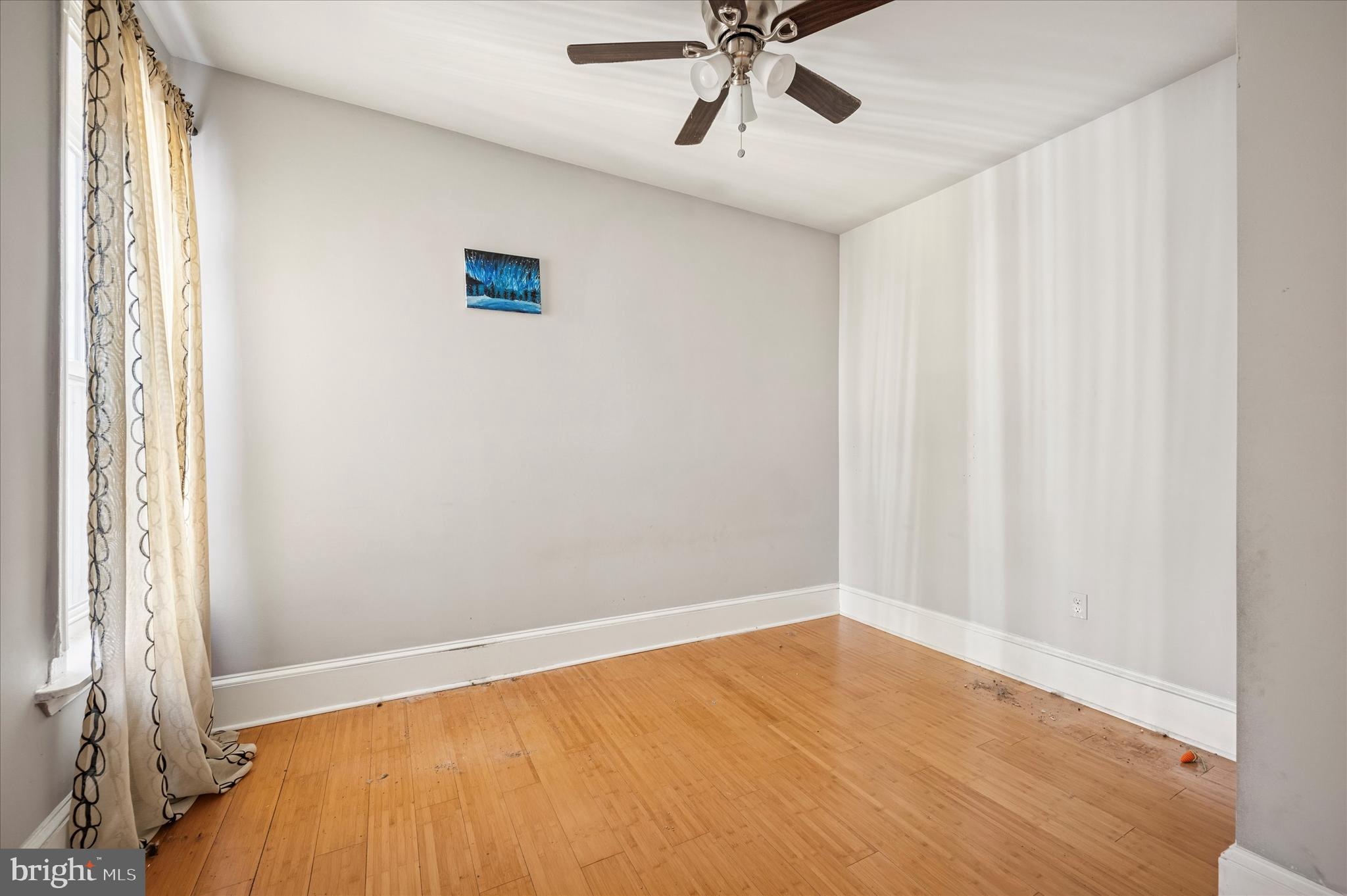 809 East Locust Avenue Philadelphia, PA 19138 - Photo 21 of 23 a view of an empty room with a window