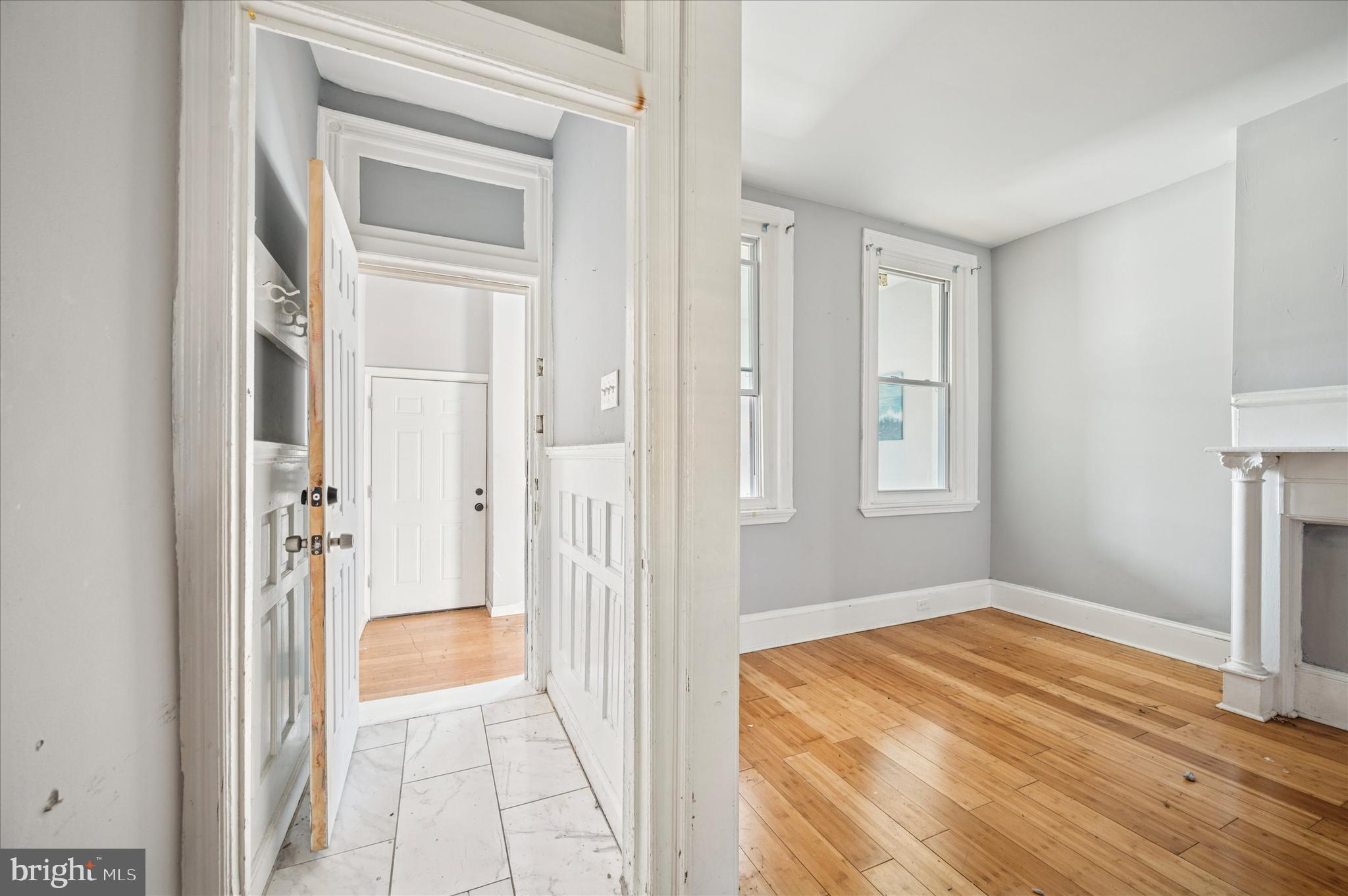 809 East Locust Avenue Philadelphia, PA 19138 - Photo 6 of 23 a view of a room with wooden floor and a bathroom
