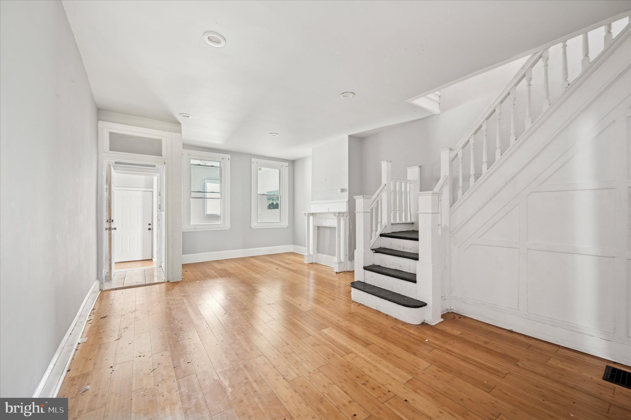 809 East Locust Avenue Philadelphia, PA 19138 - Photo 7 of 23 a view of a room with stairs and wooden floor