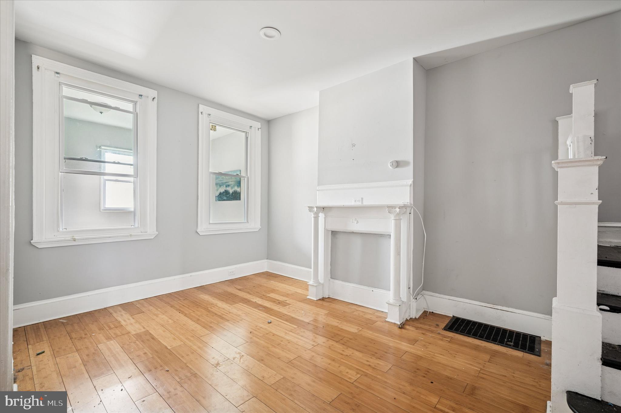 809 East Locust Avenue Philadelphia, PA 19138 - Photo 9 of 23 a view of empty room with wooden floor and fan